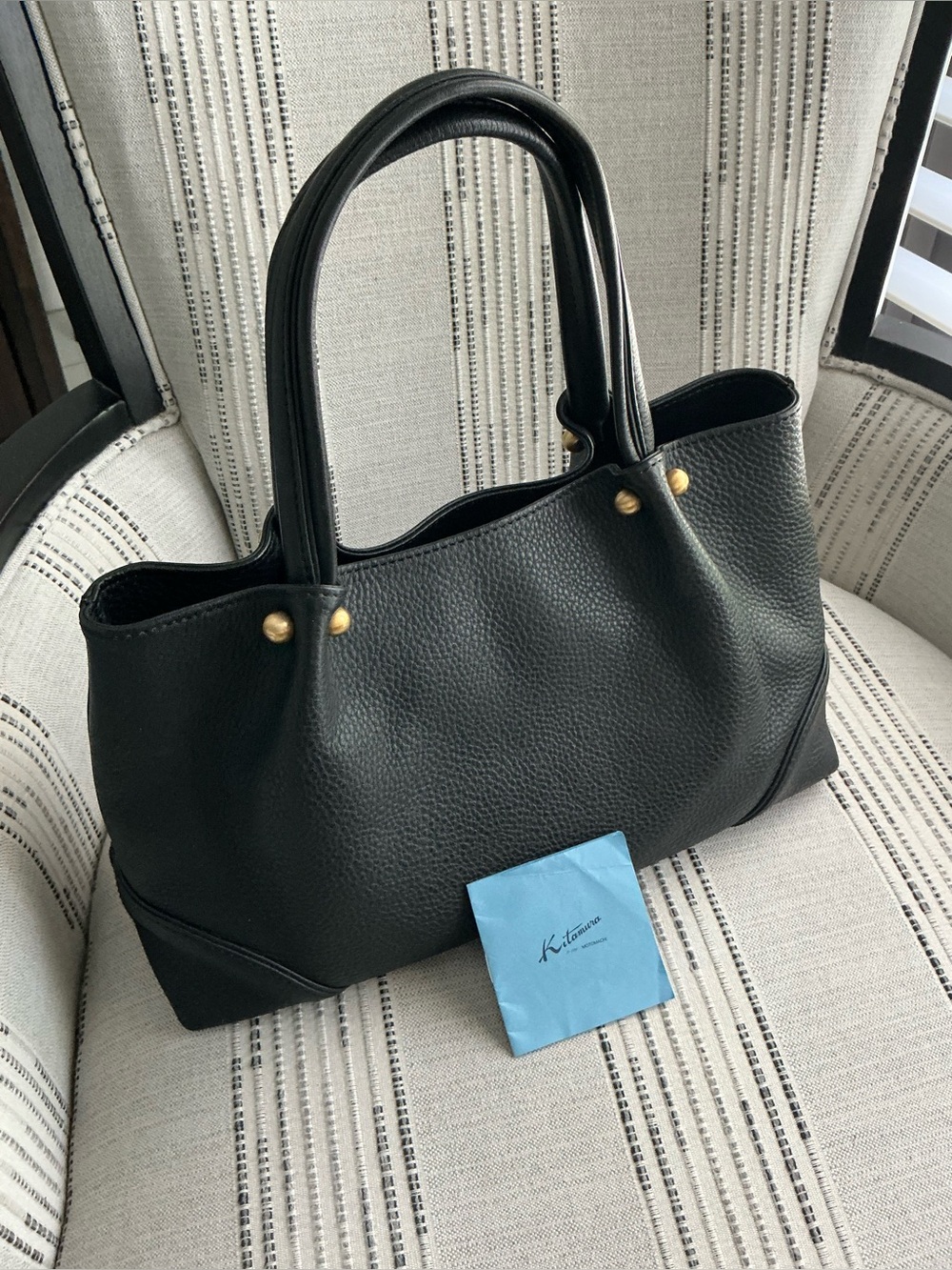 Structured Black Leather Mid Size Tote with Gold Stud Accents